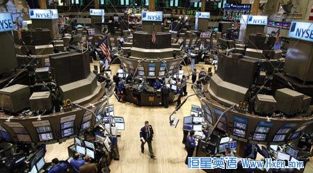 Traders work on the floor of the New York Stock Exchange, January 11, 2010.